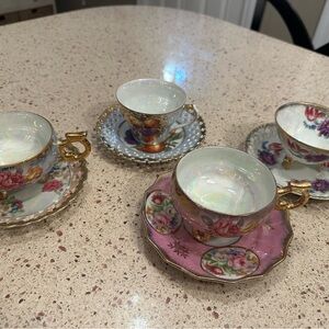Floral Teacup and Saucer Set with Gold Accents